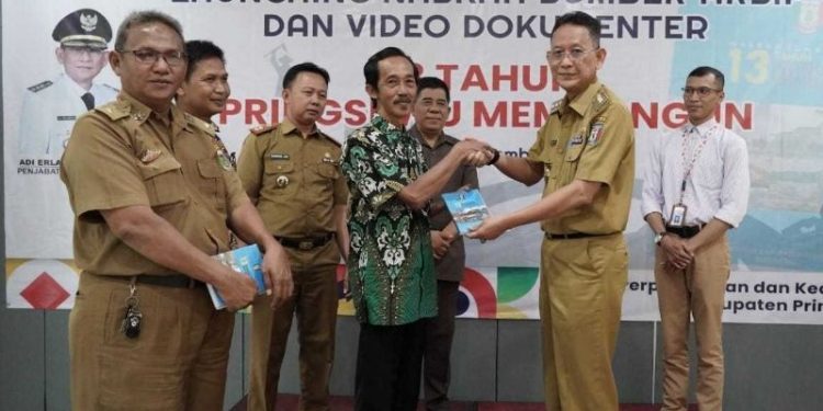 Adi Erlansyah Launching Naskah Sumber Arsip & Video Dokumenter 13 Tahun Pringsewu Membangun
