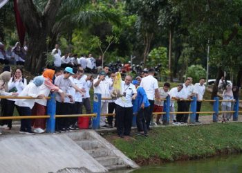 Unila Gelar Evaluasi Pengelolaan Embung Serta Pembudidayaan dan Panen Ikan