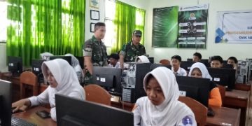 Babinsa Koramil 410-02/TBS Pantau Pelaksanaan RIKPSI CAT Online untuk Peserta Kartu Kuning