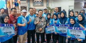 Lampung Siap Jadi Tuan Rumah Pornas Korpri 2027, Sekda Serahkan Tali Asih Atlet Berprestasi