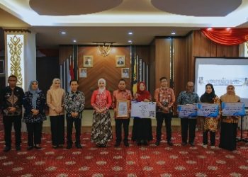 Prosesi Pelepasan Purnabakti Kepala Dinas Perkebunan Provinsi Lampung Berlangsung Khidmat